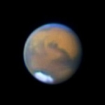 L’astronome amateur Thomas Williamson, du Nouveau Mexique, a réalisé cette image de Mars le 1er août 2003 à l’aide d’un télescope de 203 mm de diamètre et d’une webcam.