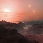 Cette vue d'artiste représente un coucher de Soleil vu depuis la super-Terre Gliese 667Cc. L'étoile la plus lumineuse dans le ciel est la naine rouge Gliese 667 C, qui fait partie s'un système d'étoiles triple. Les deux autres étoiles plus distantes, Gliese 667 A et B apparaissent également à droite dans le ciel. Les astronomes ont estimé qu'il y avait des dizaines de milliards de mondes rocheux tels que celui-ci en orbite autour de naines rouges peu brillantes, rien que dans la Voie Lactée.