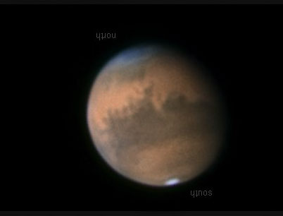 Mars vue à travers un télescope de 25 cm de diamètre le 18 septembre 2005. Le nord est en haut