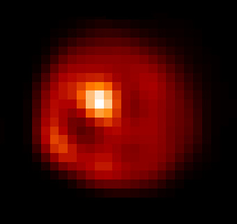 Le satellite Io observé en rayonnement infrarouge, depuis un télescope de l’Observatoire Européen Austral. Le point brillant est l’éruption du volcan Loki.